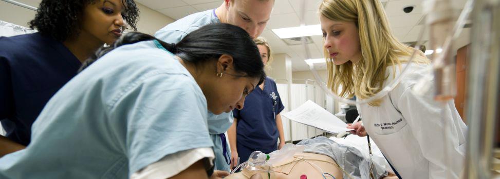 Medical and nursing students interacting in a critical care simulation